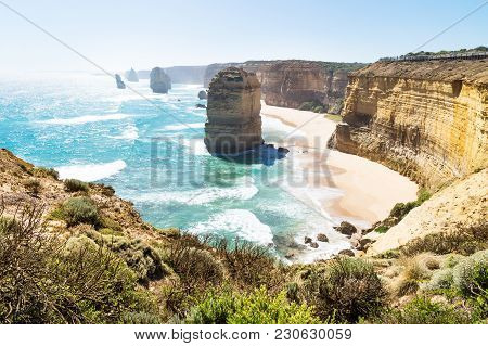 Beach And High Cliffs At Twelve Apostels At The Great Ocean Road, Victoria, Australia