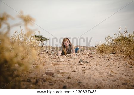 Girl Have Fun In Desert In A Summer Day