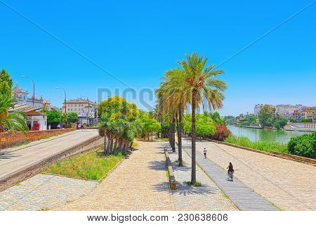 View On Downtown Of Seville And Guadalquivir River Promenade.