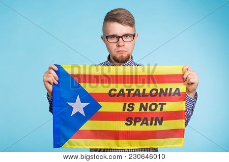 Man With Pro-independence Flag. Referendum For The Separation Of Catalonia From Spain Concept.