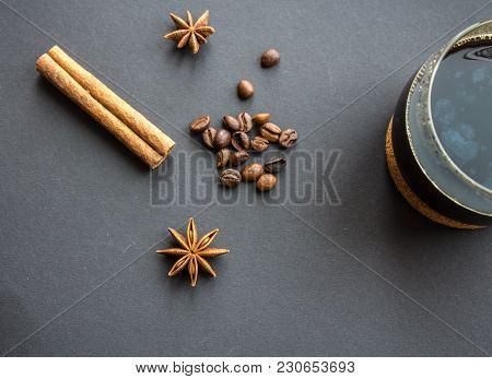 A Cup Of Coffee Cinnamon And Onyx Star With Coffee Beans