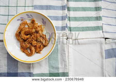 Roman-style Tripe With Tomato Sauce In A Dish On Some Colored Napkins