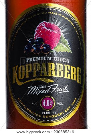 London, Uk - March 10, 2018 : Cold Bottle Label Of Kopparberg Premium Cider With Mixed Fruit Flavor 