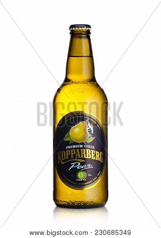 London, Uk - March 10, 2018 : Cold Bottle Of Kopparberg Premium Cider With Pear Flavor On White Back