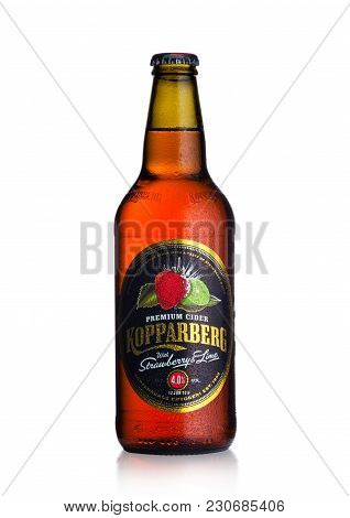 London, Uk - March 10, 2018 : Cold Bottle Of Kopparberg Premium Cider With Strawberry And Lime Flavo