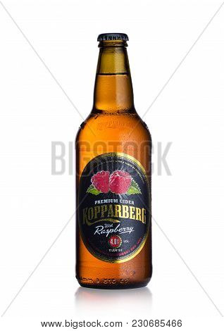 London, Uk - March 10, 2018 : Cold Bottle Of Kopparberg Premium Cider With Raspberry Flavor On White