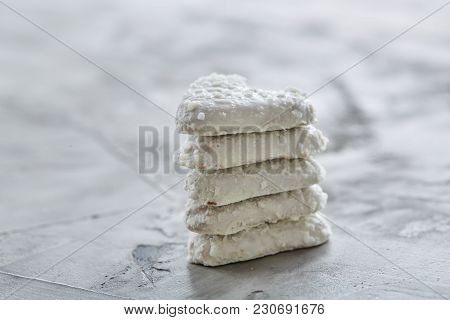 Sweet Crunchy Coconat Heart-shaped Biscuits Arranged In Pattern On Light Textured Background, Top Vi