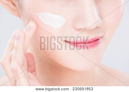 Woman Look Somewhere And Touch Face With Beauty Skin Care Concept