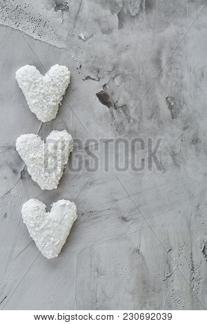 Sweet Crunchy Coconat Heart-shaped Biscuits Arranged In Pattern On Light Textured Background, Top Vi