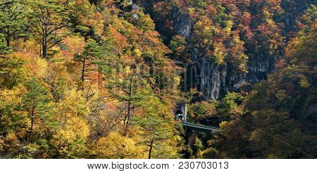 Naruko Gorge valley with train railroad tunnel in Miyagi Tohoku Japan panorama