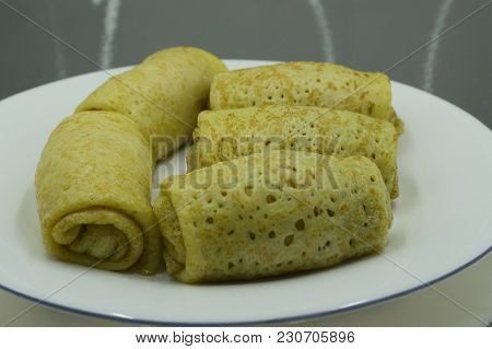 Traditional Homemade Mexican Food Tamales, Corn Dough Stuffed With Sauce Wrapped In Corn Husk In A C