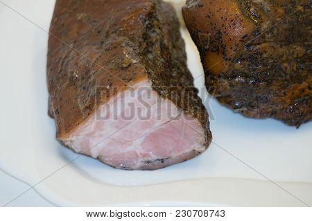 Stuffed Turkey Breast Roll. White Background. Selective Focus