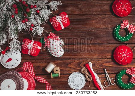 Felt Christmas Decorations On The Wooden Table - Preparing For Handmade