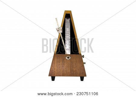 Vintage Metronome Isolated On White Background. Musical Equipment