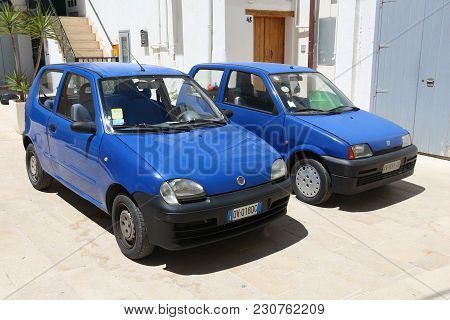 Monopoli, Italy - May 29, 2017: Blue Fiat Seicento And Cinquecento - Two Generations Of Small Cars P