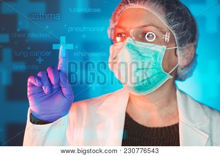 Pulmonologist Healthcare Professional In Hospital Clinic. Portrait Of Female Medical Specialist Trea