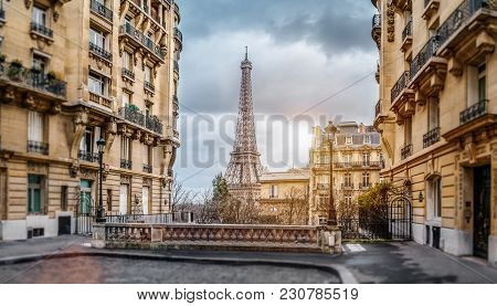 The Eifel Tower In Paris From A Tiny Street