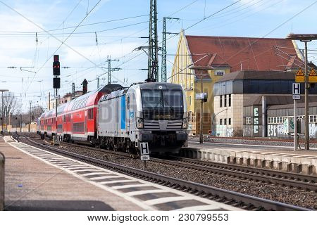 Fuerth / Germany - March 11, 2018: Re Regional Express Train From Deutsche Bahn Passes Train Station