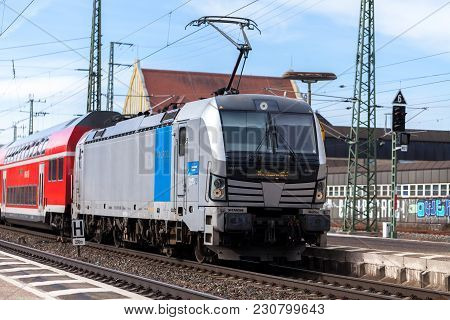 Fuerth / Germany - March 11, 2018: Re Regional Express Train From Deutsche Bahn Passes Train Station