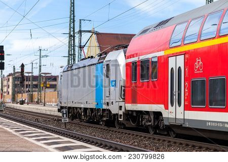 Fuerth / Germany - March 11, 2018: Re Regional Express Train From Deutsche Bahn Passes Train Station