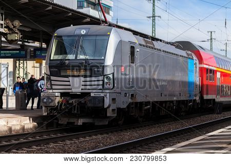 Fuerth / Germany - March 11, 2018: Re Regional Express Train From Deutsche Bahn Passes Train Station