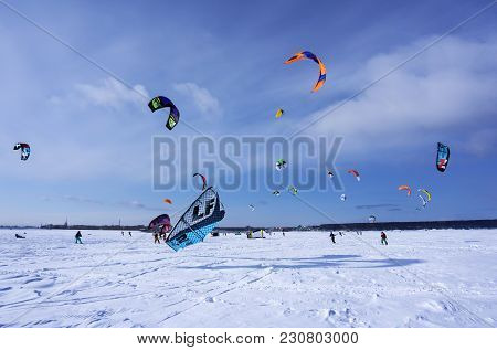 Perm, Russia - March 09, 2018: Snow Kiters Rides On The Ice Of A Frozen River