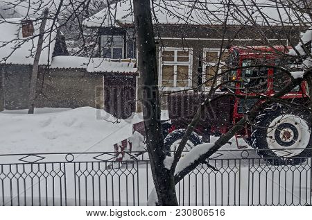 Snow Plough Removing Snow From Road In Winter Storm, Zavet, Bulgaria, Europe