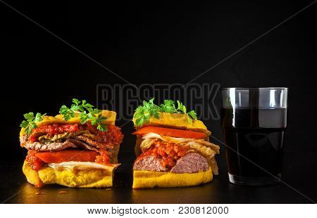 Italian Sandwich With Sausage  Salamella And Bread With Turmeric And Glass Of Red Wine