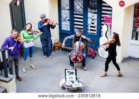 London, United Kingdom, 7th March 2018:-a Street Performance In Covent Garden Of A String Quintet Bu