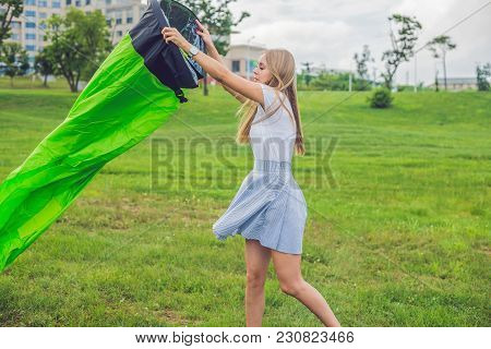 A Woman Tries To Inflate An Air Sofa. Lamzac