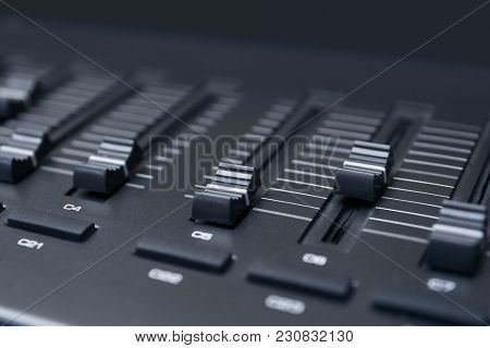 Multi-channel mixer at radio station, closeup