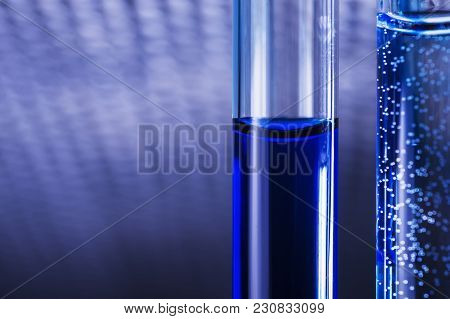 Blue Liquid In Tubes On Medical Background