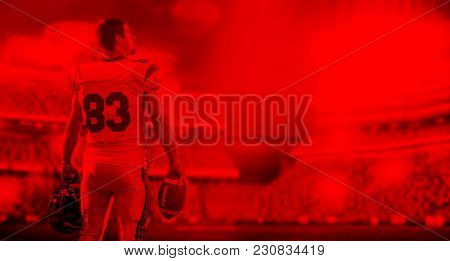 duo toned american football player in  arena at night with stadium lights
