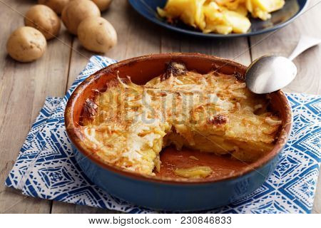 Potatoes a la dauphinoise in a baking dish