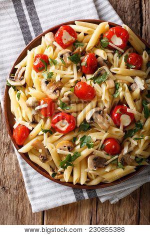 Vegetarian Food: Pasta Penne With Champignons, Tomatoes, Stuffed Peppers Close-up. Vertical Top View