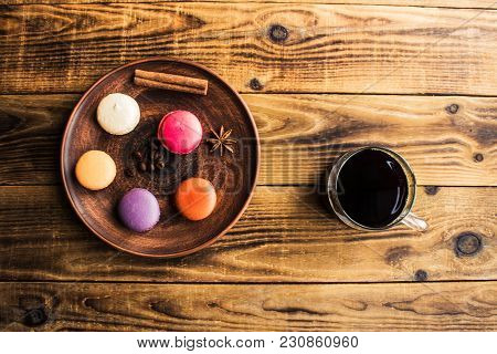 Cup Of Coffee And Macarons