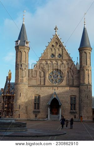 THE HAGUE, NETHERLANDS - JANUARY 4, 2017: People in Binnenhof in front of the Ridderzaal, meaning the Knight's Hall. Built in 13th century as a ballroom, now it used when the King holds his Speech
