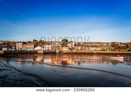 Scenic View Of The Harbor Of Kinsale In The County Of Cork, Ireland With Low Tide At Sunset