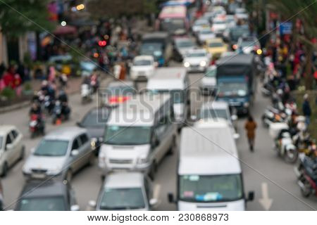 Aerial Blurred Image Of Traffic Jam In City. Urban Infrastructure Problem.