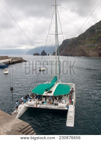 Porto Moniz, Madeira, Portugal - September 5, 2016: Catamaran While Sailing With Tourists Docked In 