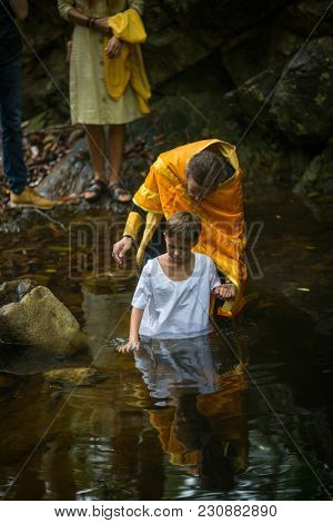 KOH CHANG, THAILAND - MAR 9, 2018: During Christian sacrament of spiritual birth - Baptism. There are currently 10 Orthodox parishes in Thailand, Orthodoxy is practiced by 0.002% of population.