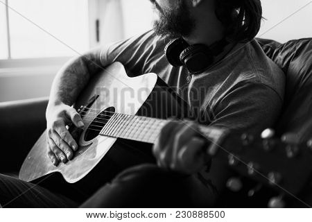 Caucasian man in a songwriting process music concept
