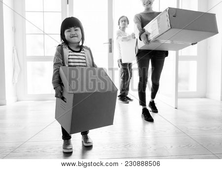 Asian family emoving to new house