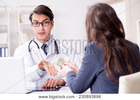 Doctor in corruption concept with being offered bribe