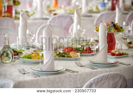 Beautiful Table Setting With Crockery And Flowers For A Party, Wedding Reception Or Other Festive Ev