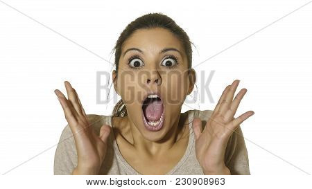 Head Portrait Of Young Happy And Excited Hispanic Woman 30s In Surprise And Astonished Face Expressi
