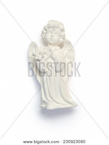 Small Plaster Angel. Symbol Of Easter Isolated Clipping Mask On White Background With Path, Top View