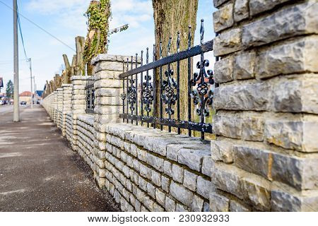 Wrought Iron And Cut Stone Fence, Fence On Wall
