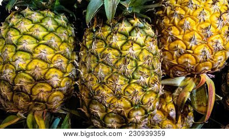 Pineapples For Sale At The Fruit Market.