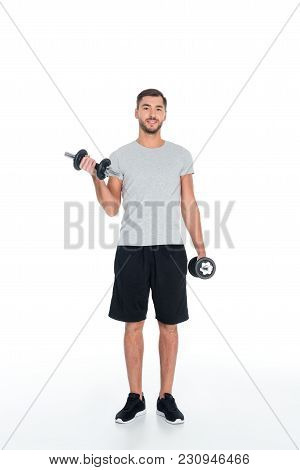 Sportsman Exercising With Dumbbells Isolated On White